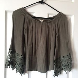 Green off the shoulder shirt
